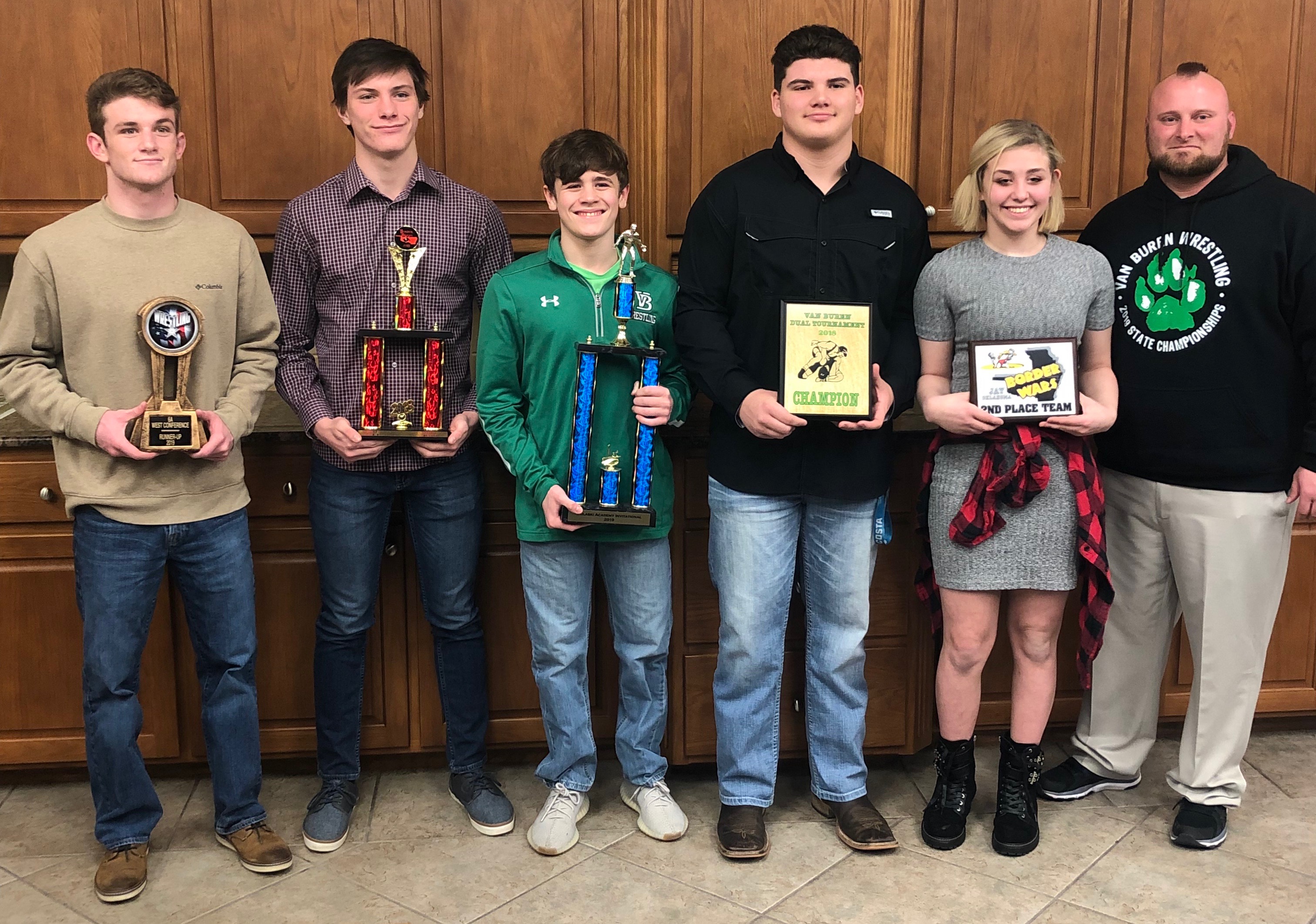 Board honors State Champion wrestlers and writers